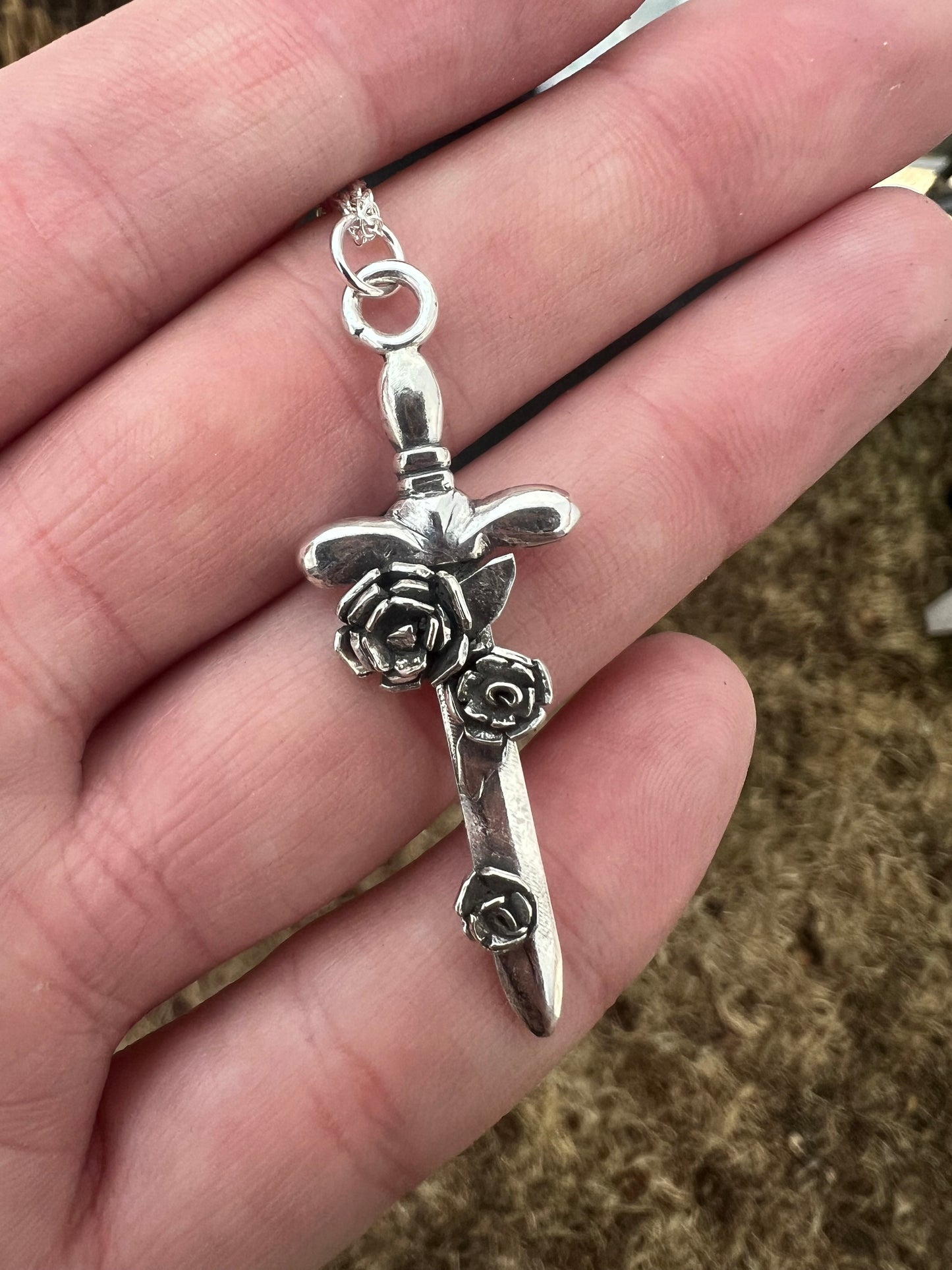 floral sword with removable pear garnet necklace