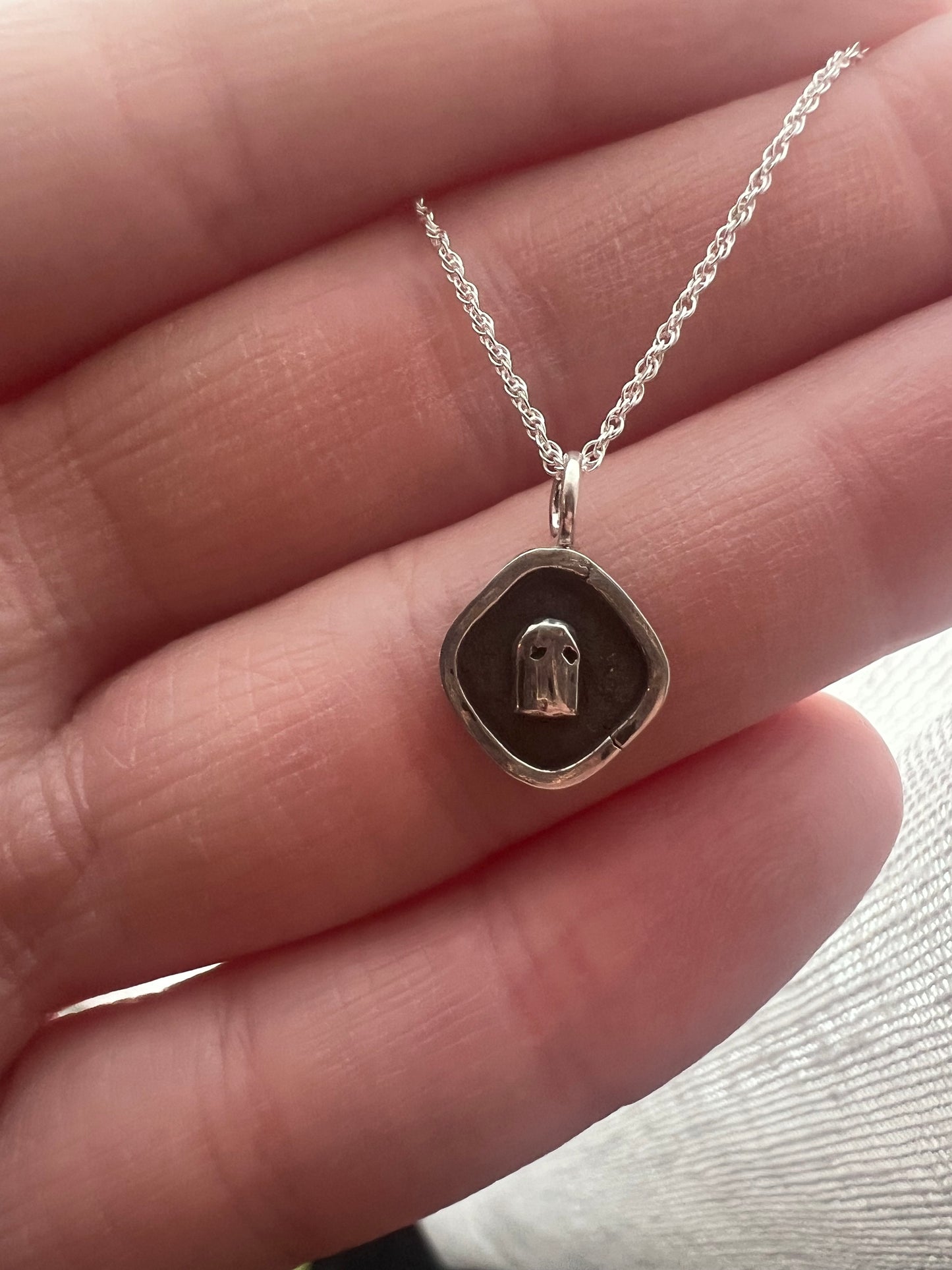 diamond ghost pendant
