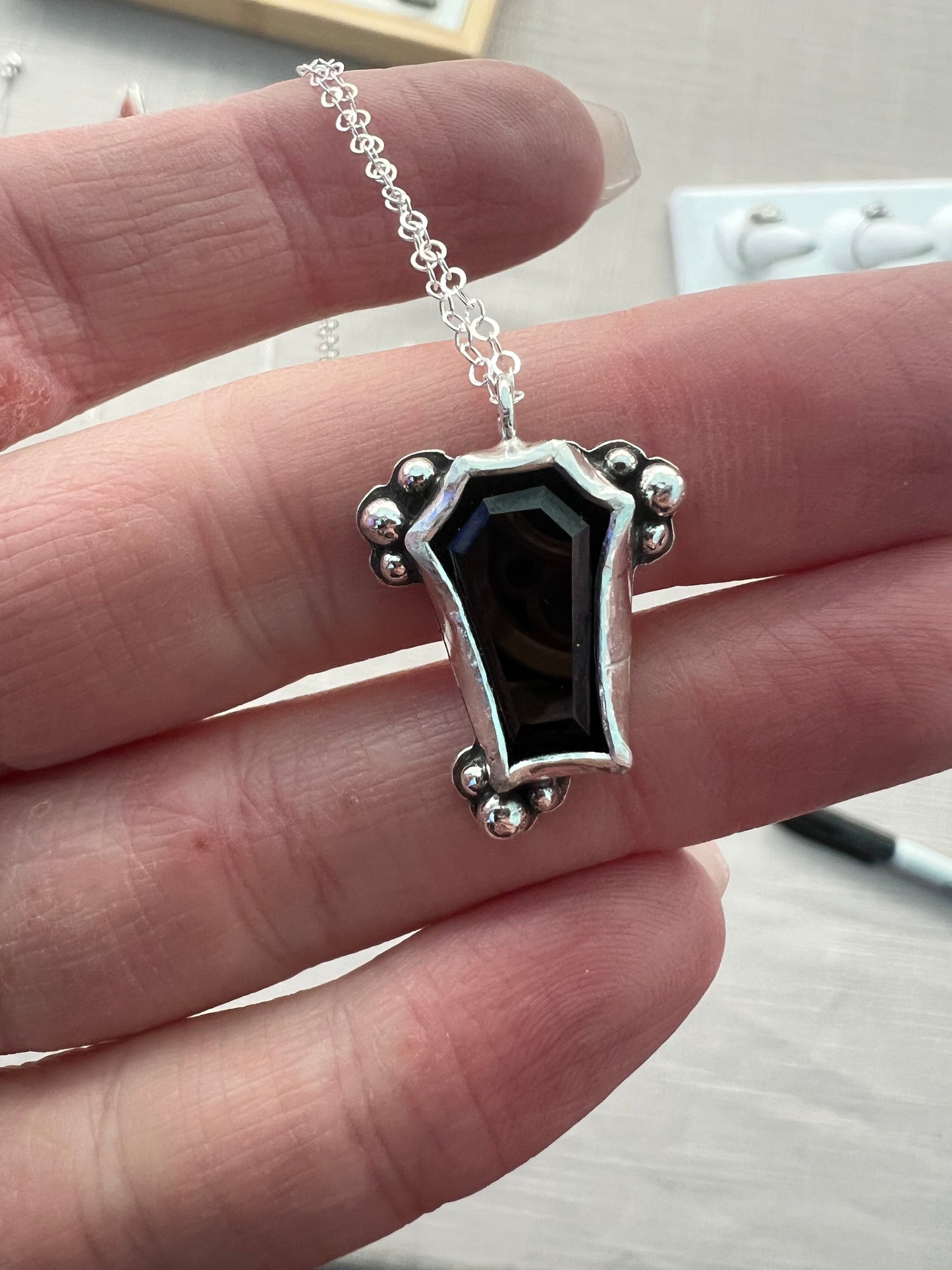 onyx coffin necklace