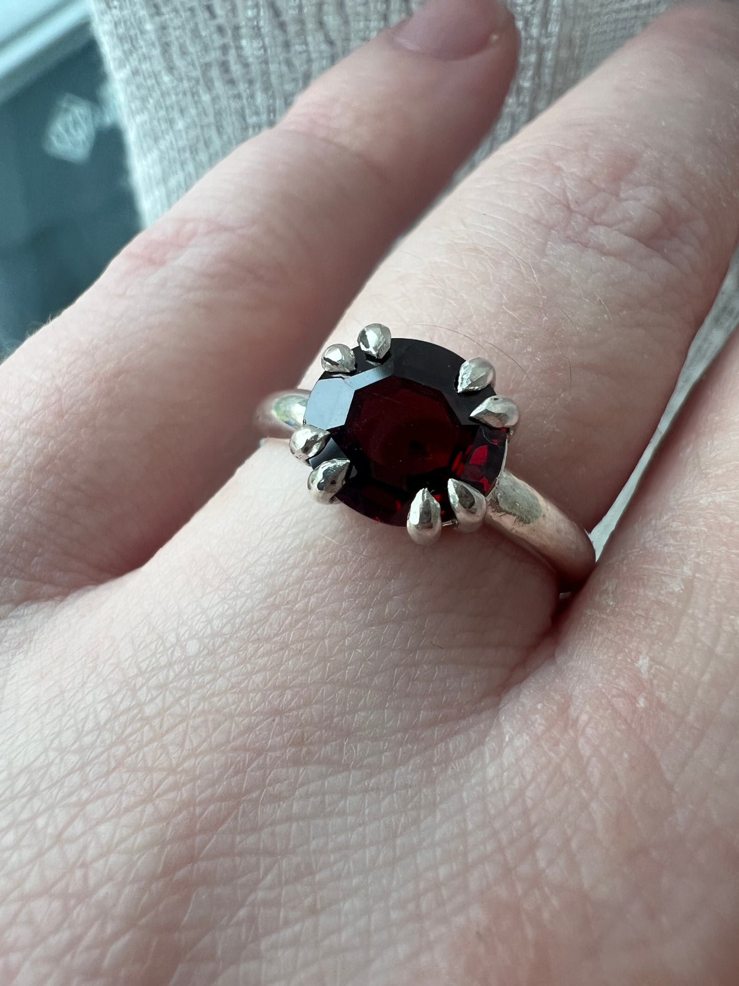 garnet oval double claw ring