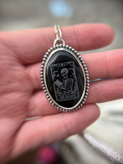 reading skeleton onyx necklace