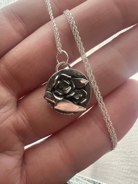 round floral knife pendant
