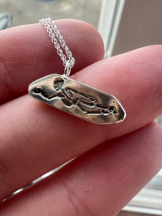 skeleton stamp necklace