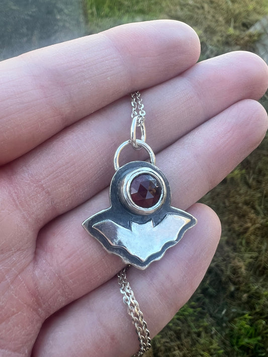 garnet round rose cut bat necklace